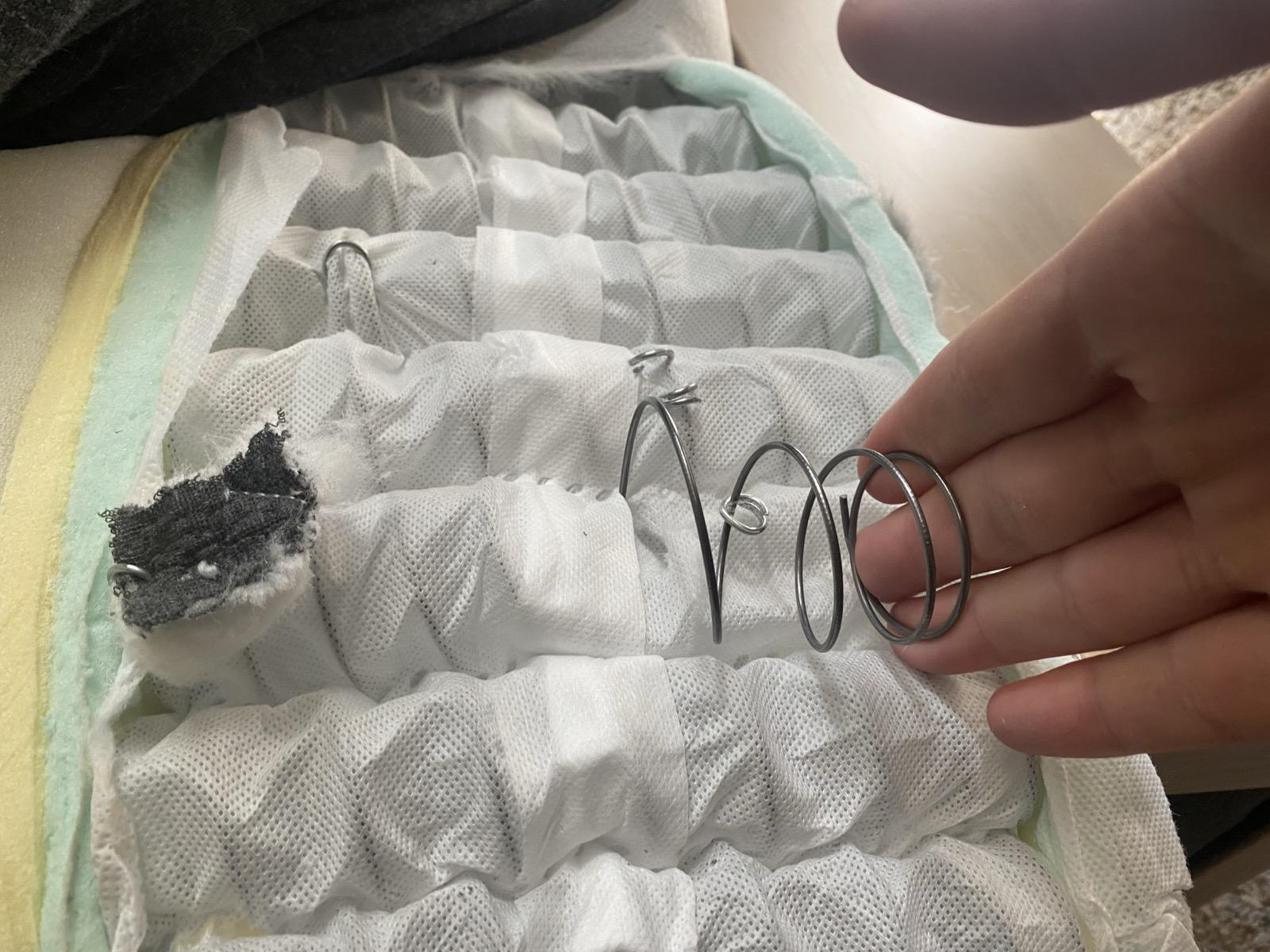Failed spring unit from recycled mattress